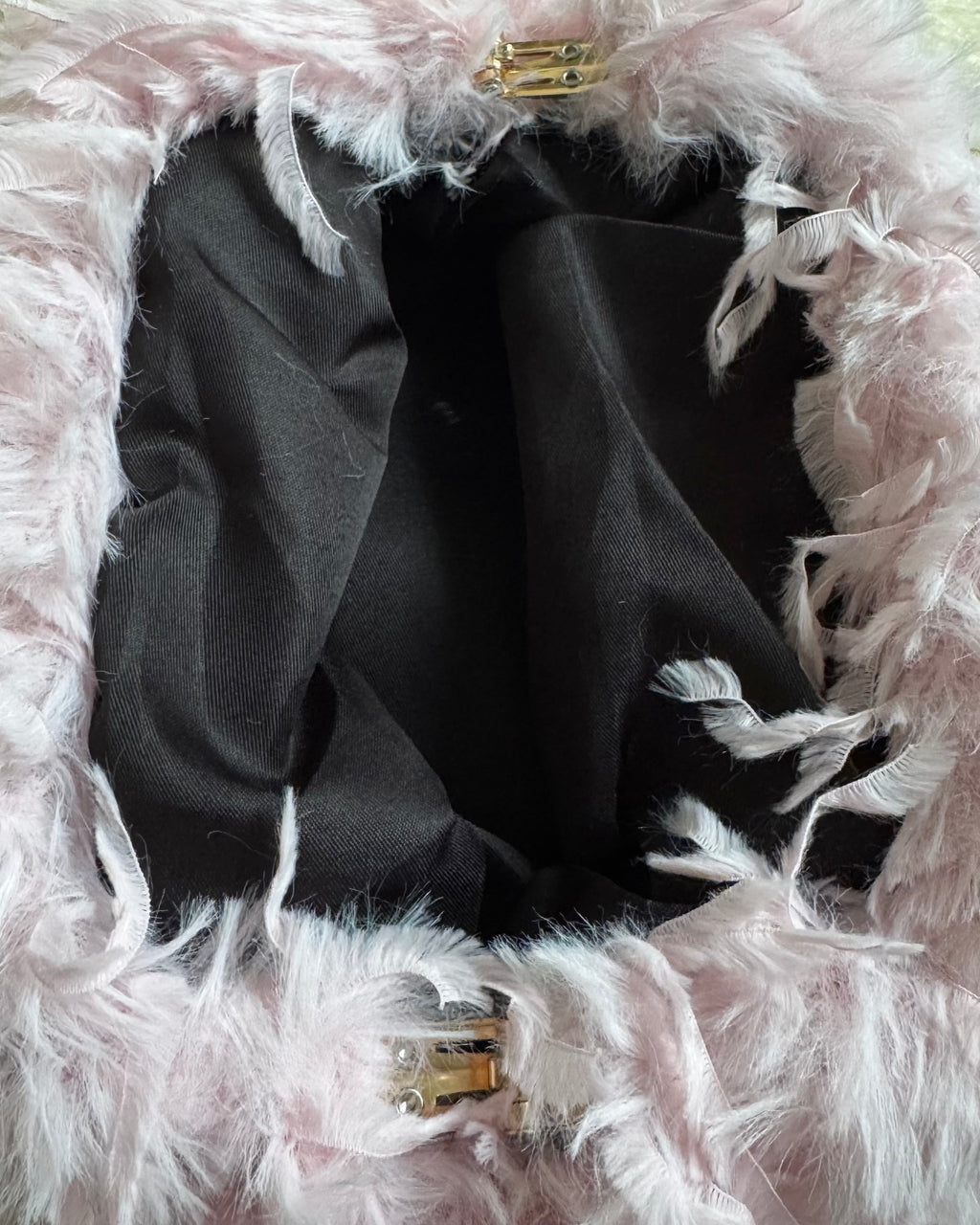 Pink feathers clutch